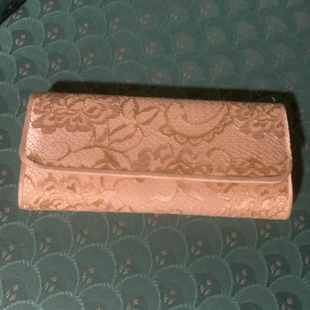 Lace clutch in gold and ivory with rope shoulder strap